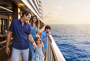 Family outside enjoying cruise